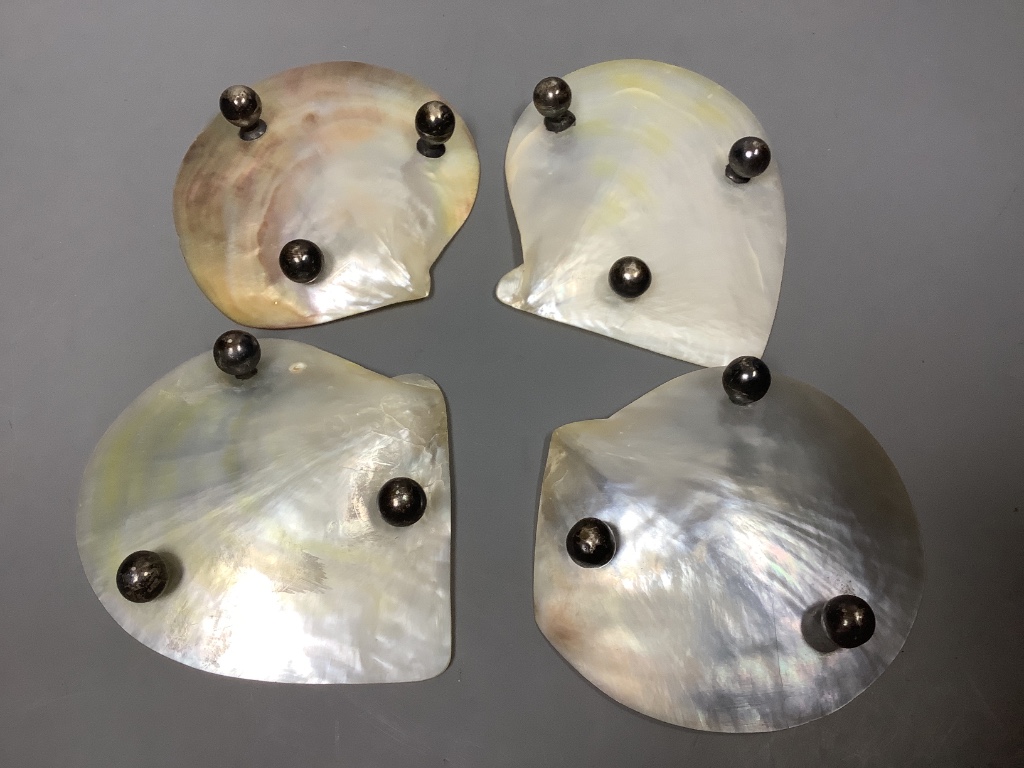 A set of four Chinese mother of pearl dishes, approx. length 11.5cm